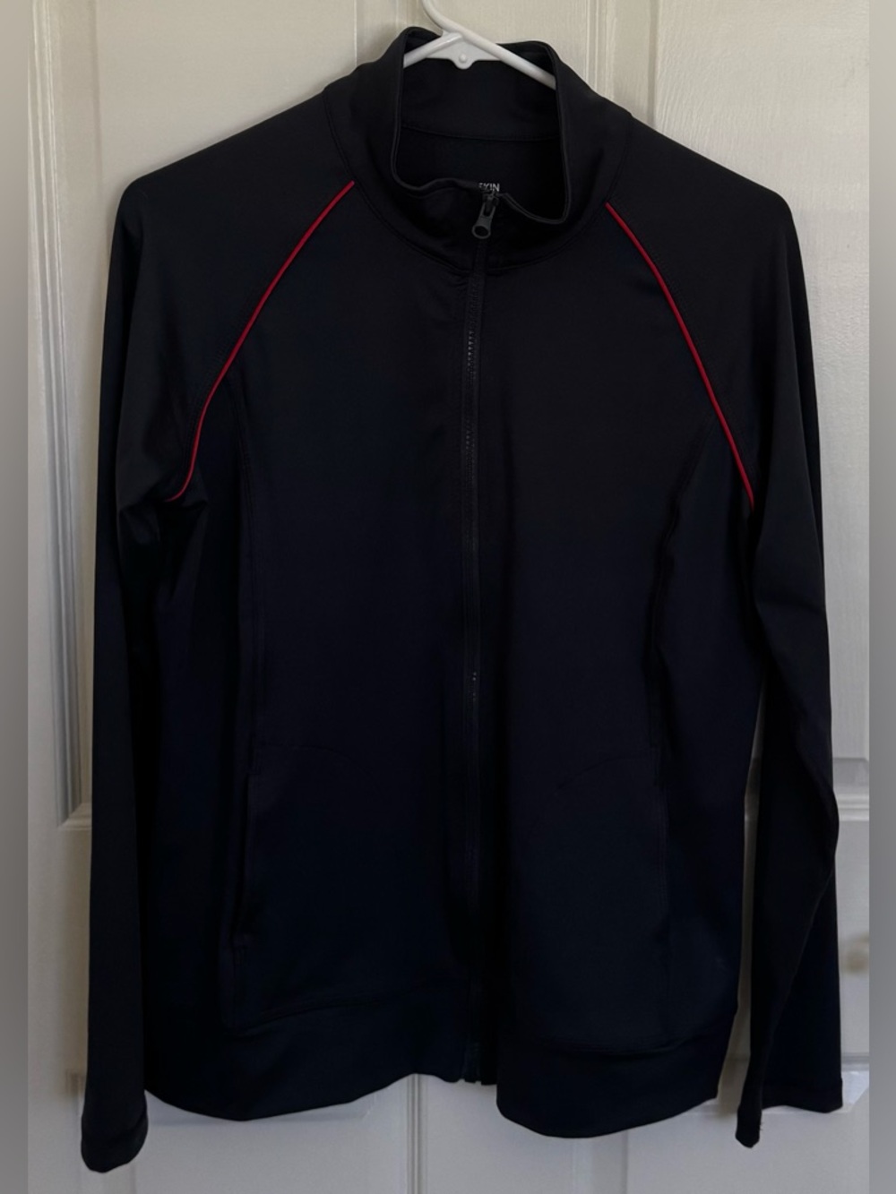 Danskin NOW long sleeved jacket size large. Dark gray with red piping. EUC.